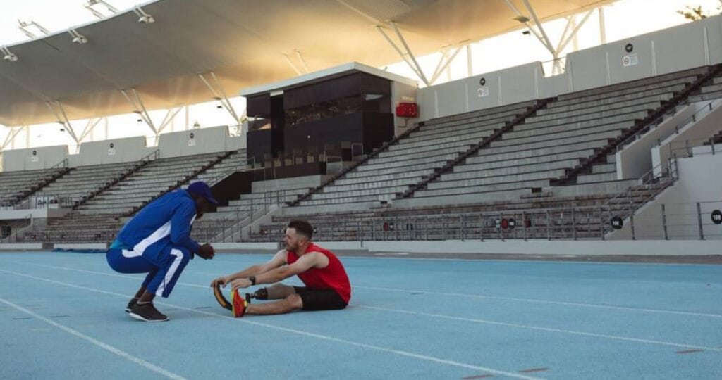 Running coach guiding athlete